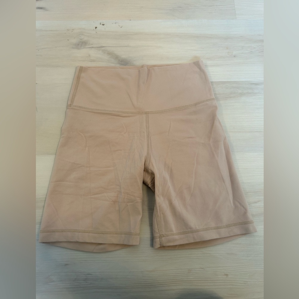 Beige Tna biker shorts. Size medium